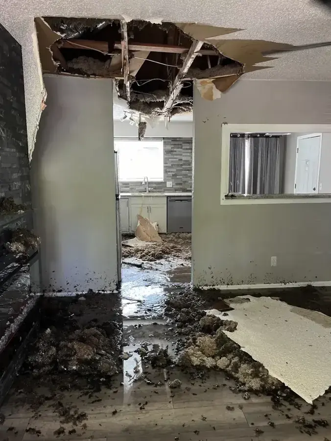 A water damaged Lewisville Lake area home being dried by a restoration crew